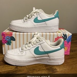 Worn once women’s Air Force 1 teal colored size 6